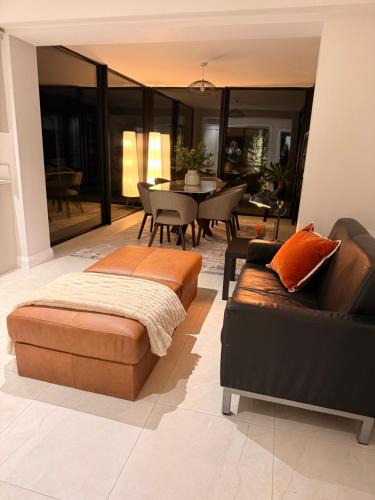 Newry House | Modern Entire Home steps from the Train Station