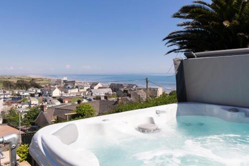 Pendine House | Rose Cottage - Sea Views Hot Tub Log Burner