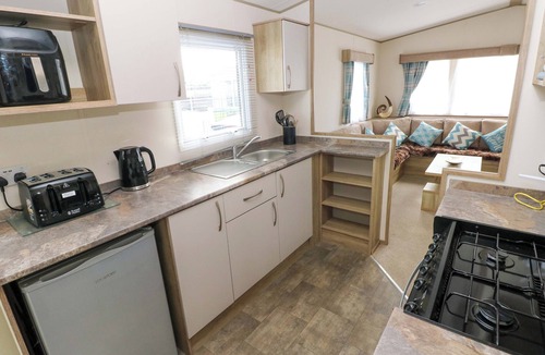 Tenby Cottage | 82 MANORBIER PARK, family friendly, with pool in Manorbier