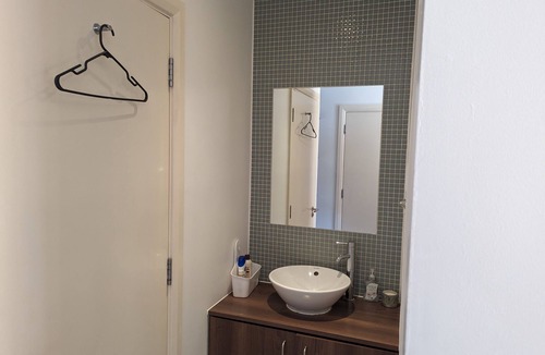 Stratford and New Town Apartment | A large double bedroom with en-suite