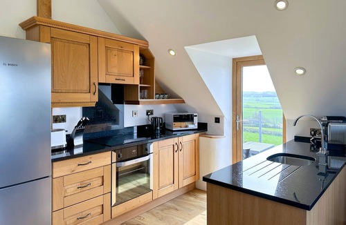 Marhamchurch Apartment | Apartment Style Barn with Balcony, Sea and Countryside Views