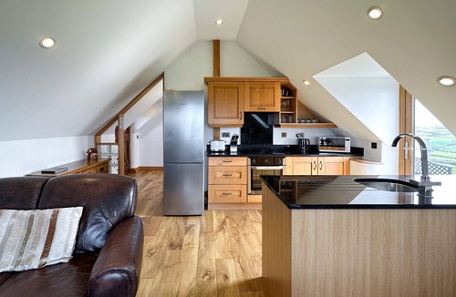 Marhamchurch Apartment | Apartment Style Barn with Balcony, Sea and Countryside Views