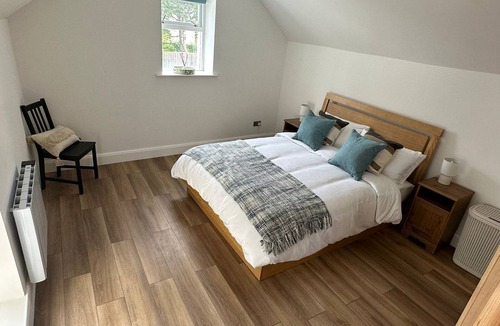 Cushendall House | Central Accommodation in a Converted Stables with a Hot Tub & Enclosed Yard