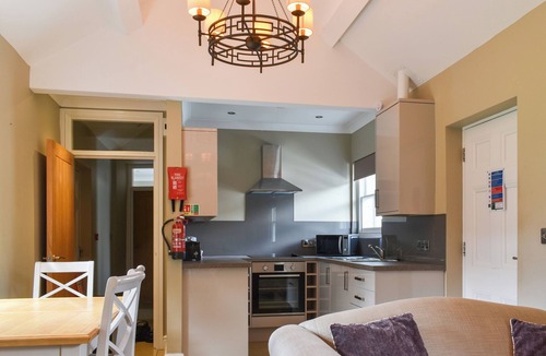 Aberystwyth Apartment | Great ground floor apartment in the heart of Aberystwyth with shared hot tub.