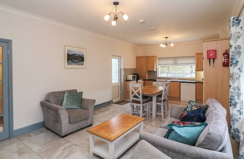 Kenmare Cottage | NO 1 LODGE WOOD, pet friendly in Kenmare, County Kerry