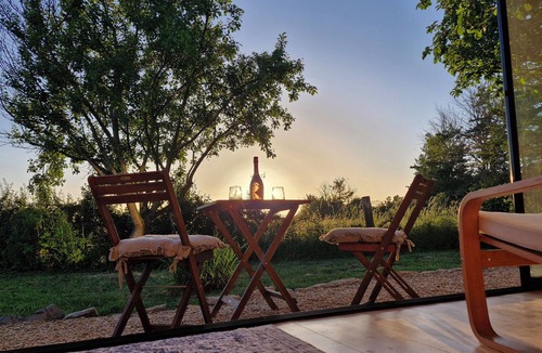 Chippenham Cabin | Private, air-conditioned log cabin, with field views, own garden and shower room
