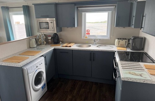 Porthcawl Cabin | Sea Front 2 Bedroom Lodge (Honeysuckle 95) at Trecco Bay Holiday Park, Porthcawl