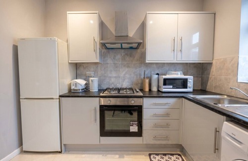 Wigan House | Sleeps six in style with three modern bathrooms, minutes from Wigan town centre
