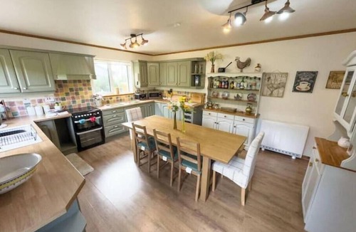 Suladale House | Spacious Family Retreat with Stunning Loch Views near Portree