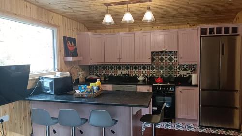 Glen of Aherlow Ski Chalet | Stream-side cabin with private sauna option