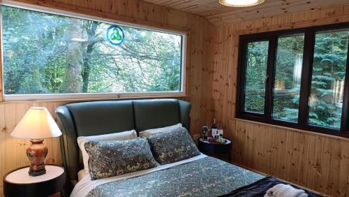 Glen of Aherlow Ski Chalet | Stream-side cabin with private sauna option