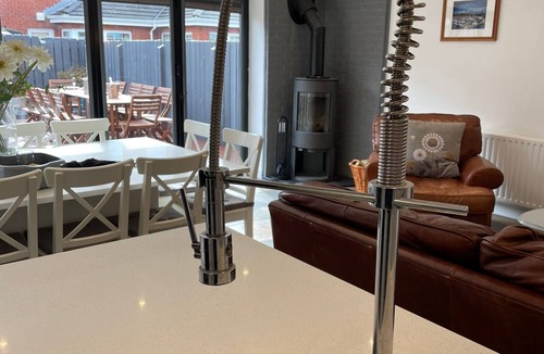 Portrush House | The Glynn, Portrush. Deluxe holiday home, 8 beds 12 guests 5 bedrooms.