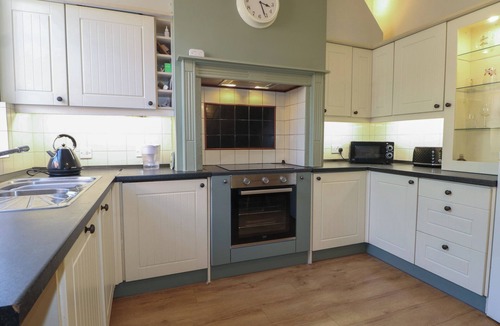 Selsey Cottage | THE OLD SCHOOL HOUSE, pet friendly, with a garden in Selsey