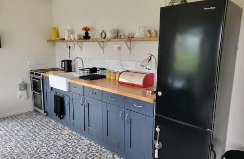 Tudenham House | The Tin Shed