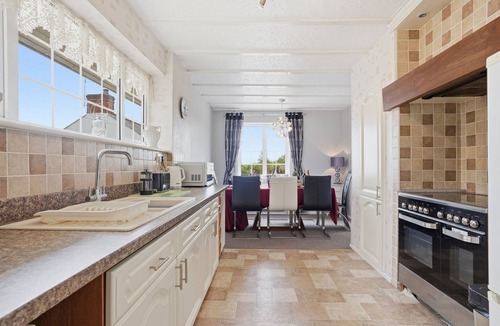 Horning House | Tracara in Horning, riverside location sleeps 8. Family & Pet friendly.