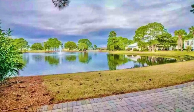 FREE GOLF CART! Stocked Lake w/amazing views! 5 Mins. To Dining, Beach & pool. in Miramar Beach
