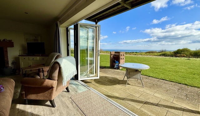 Len's Sandy Collection - 3 Cottages that sleeps 16 guests in 8 bedrooms