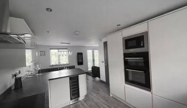 Spacious five-bedroom modern countryside escape perfect for families and groups in Manchester