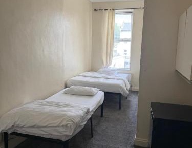 Triple Room with Shared Bathroom